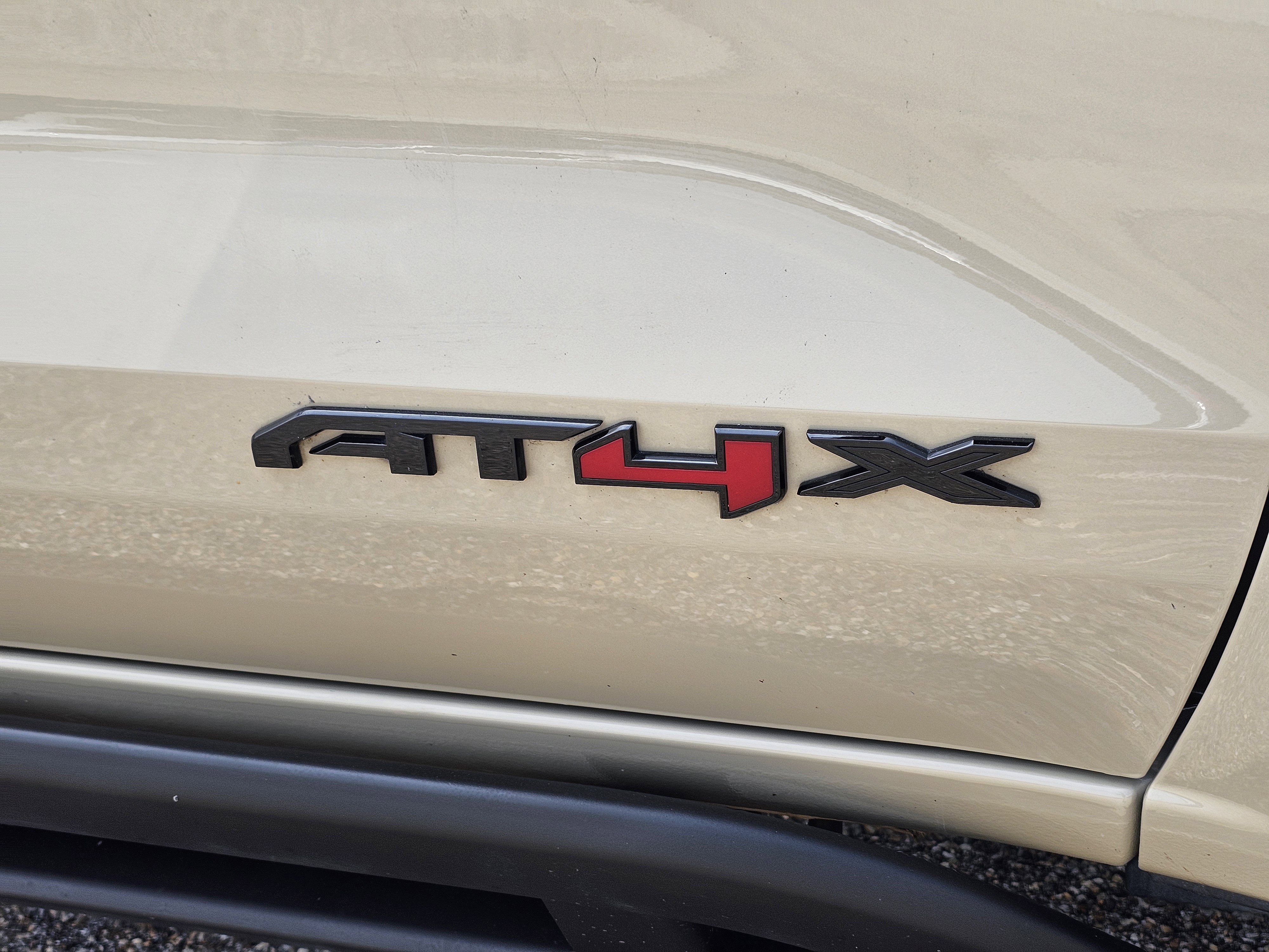 Used 2023 Desert Sand Metallic GMC 4WD AT4X image 7