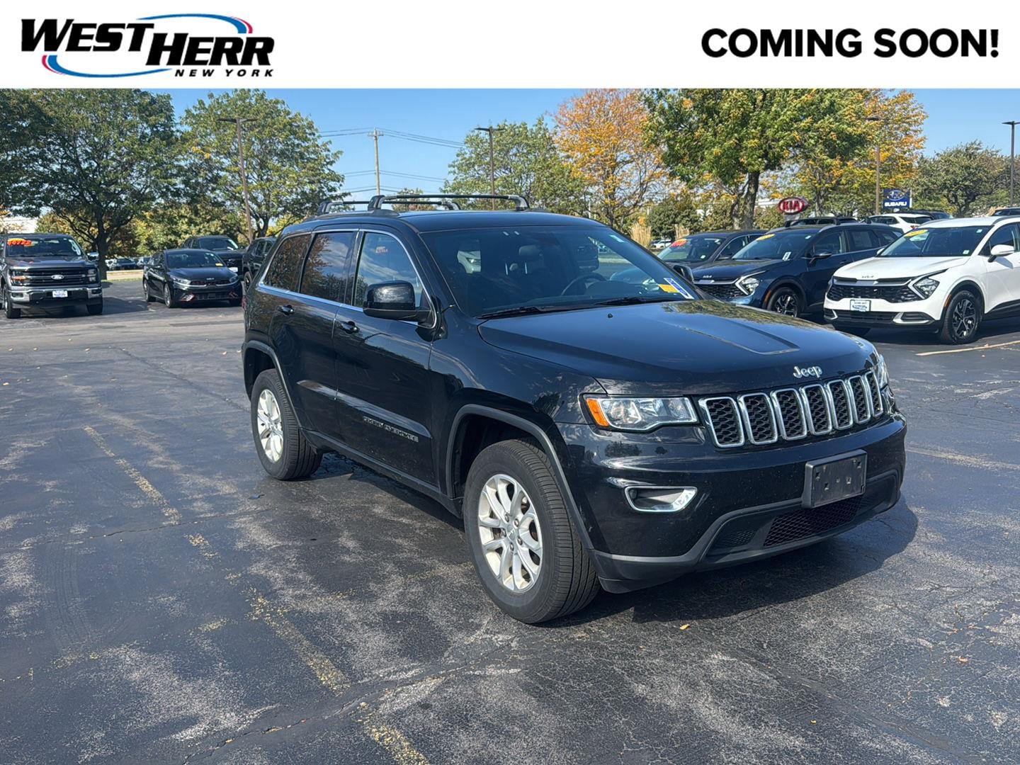 Used 2021 Diamond Black Crystal Pearlcoat Jeep Laredo E image 1