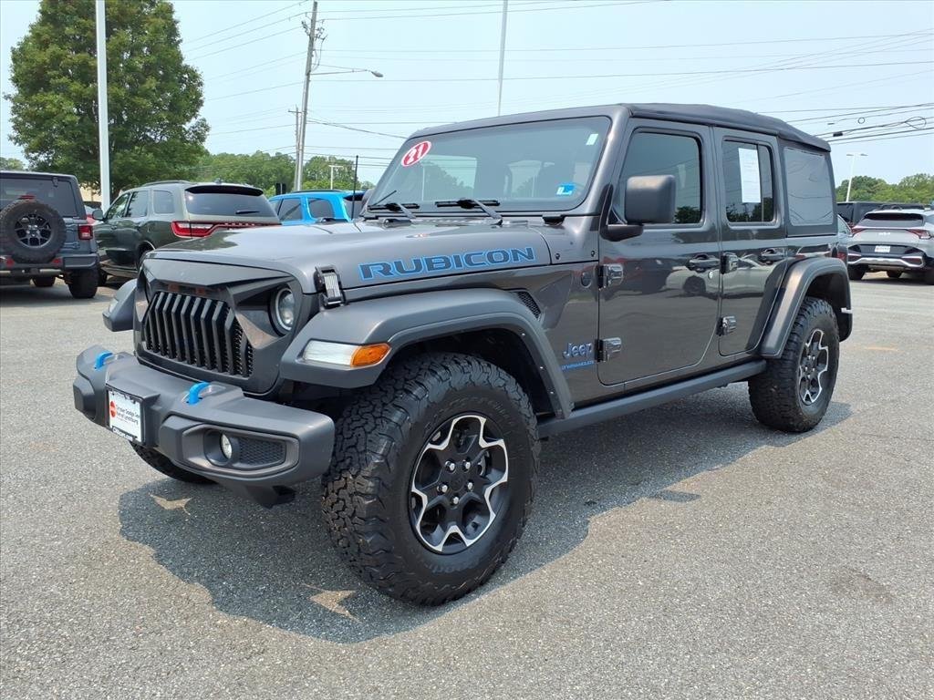 Used 2021 Granite Crystal Metallic Clearcoat Jeep Unlimited Sport Altitude image 1