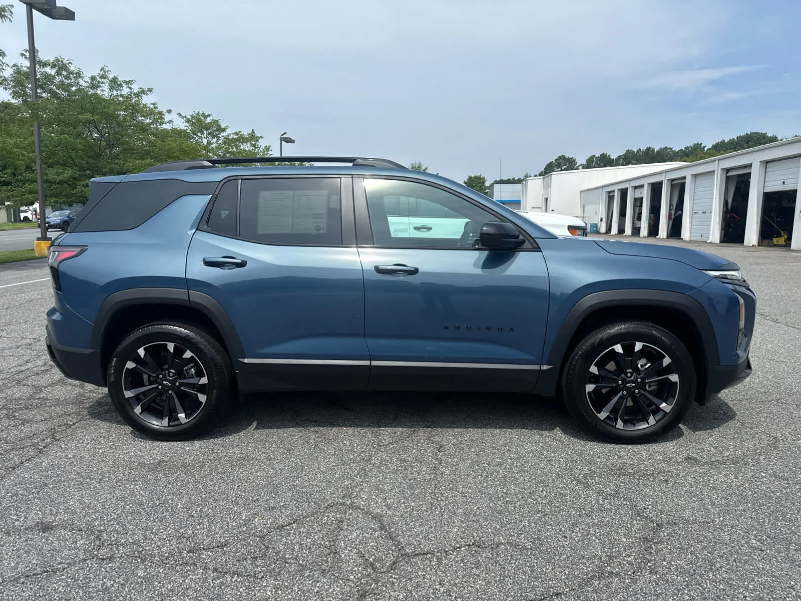 Used 2026 Lakeshore Blue Metallic Chevrolet AWD RS image 7