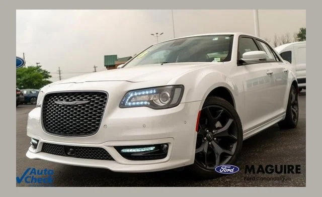 Used 2023 Bright White Clearcoat Chrysler Touring image 1