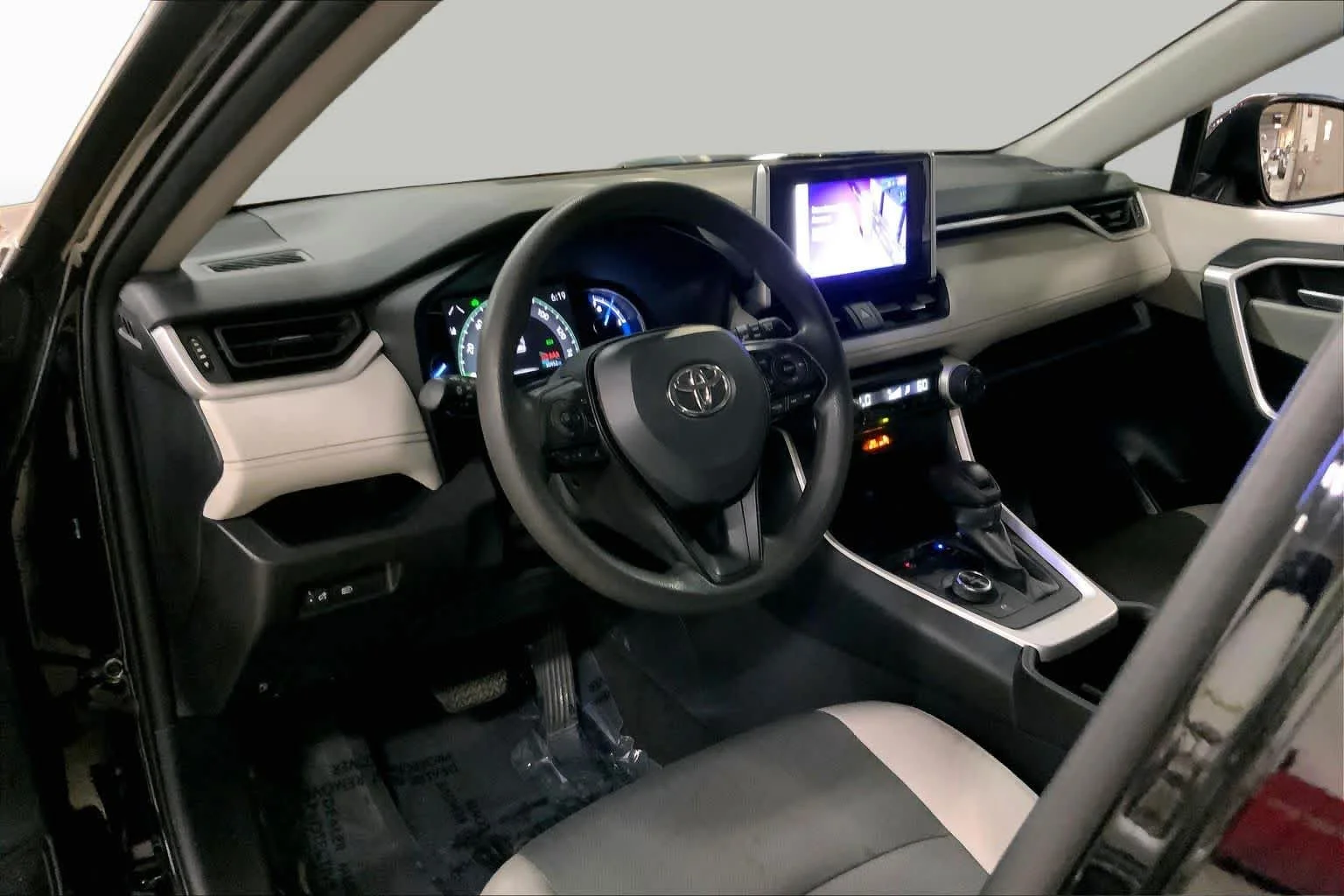 Used 2025 Midnight Black Metallic Toyota Hybrid XLE image 18