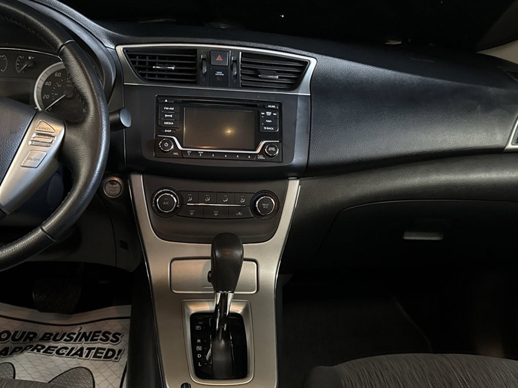 Used 2015 Gun Metallic Nissan SV image 24