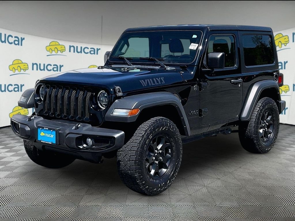 Used 2023 Black Clearcoat Jeep Sport image 3