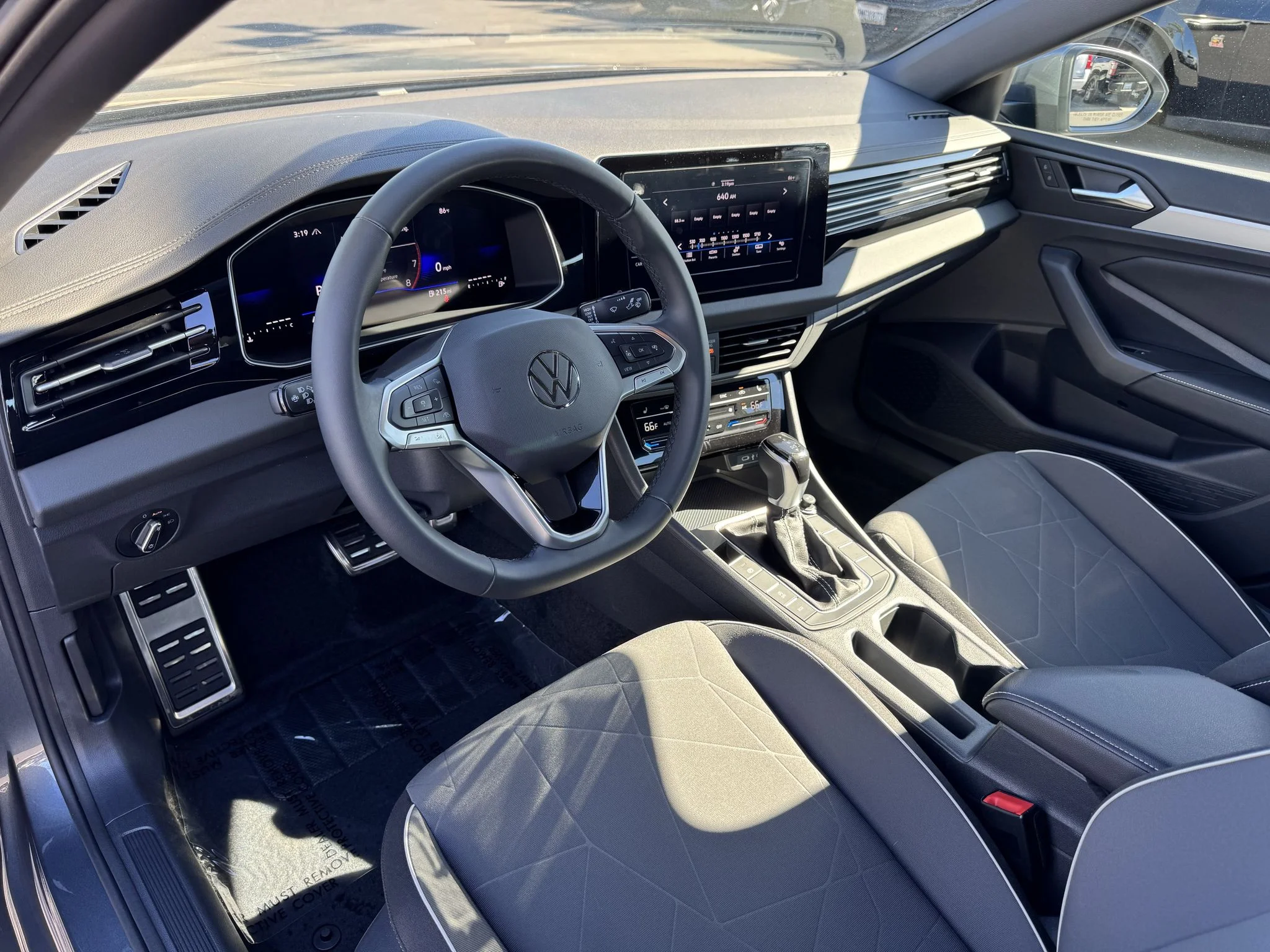 Used 2026 Platinum Gray Metallic Volkswagen Sport image 13