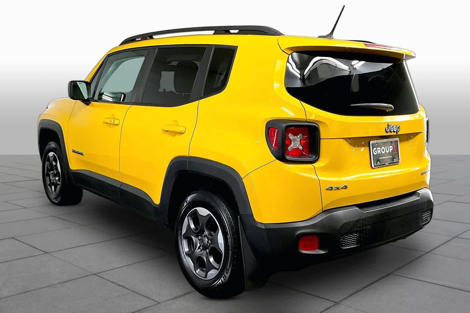 Used 2017 Solar Yellow Jeep Sport image 12