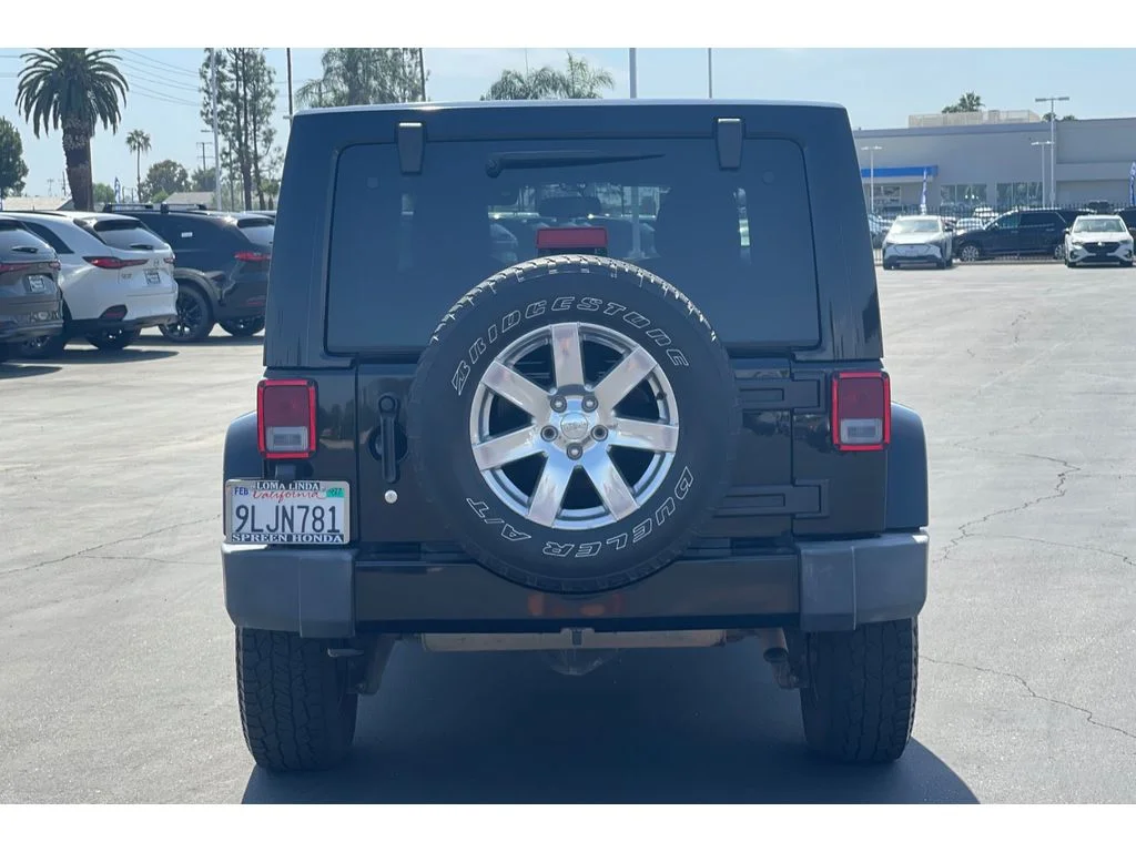 Used 2017 Black Clearcoat Jeep Sahara image 4