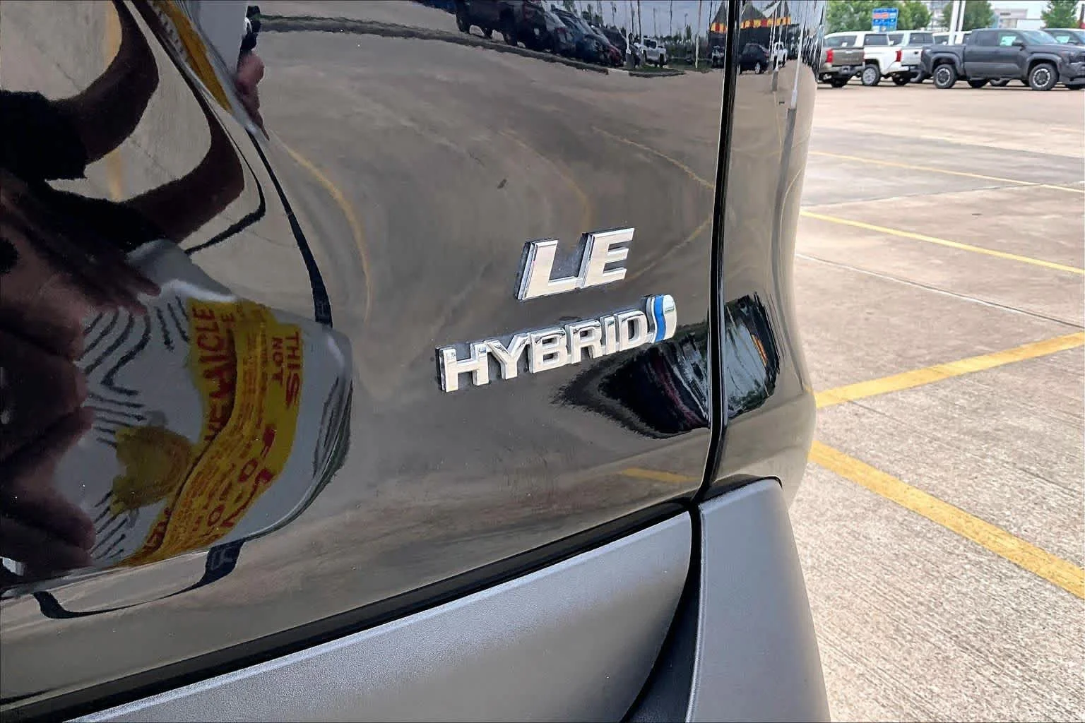 Used 2024 Midnight Black Metallic Toyota Hybrid LE image 10