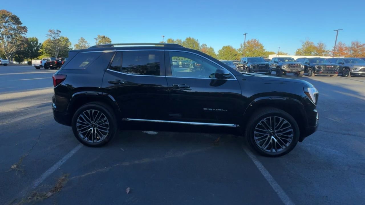 Used 2026 Ebony Twilight Metallic GMC Denali image 2