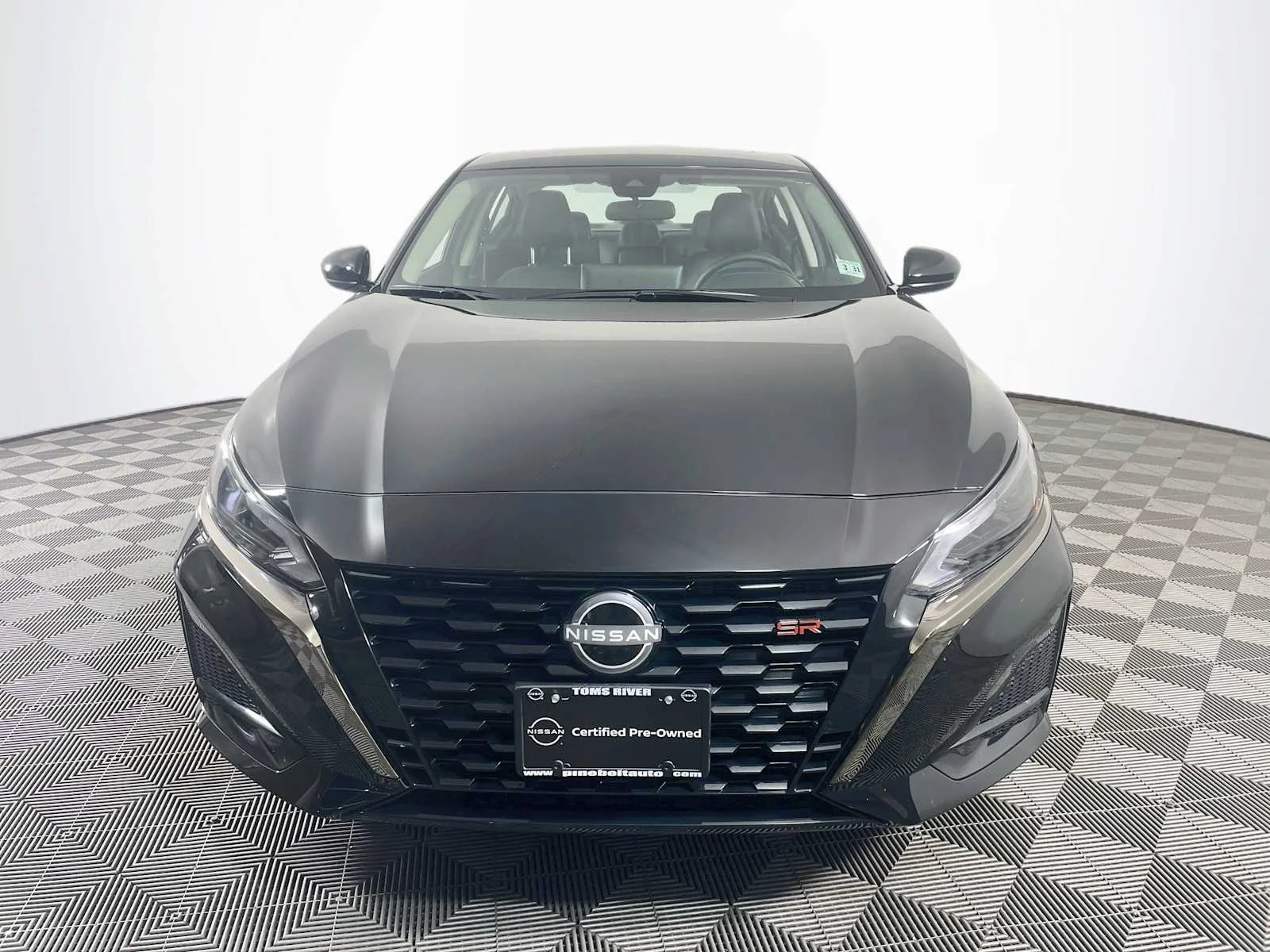 Certified Used 2025 Super Black Nissan SR image 2