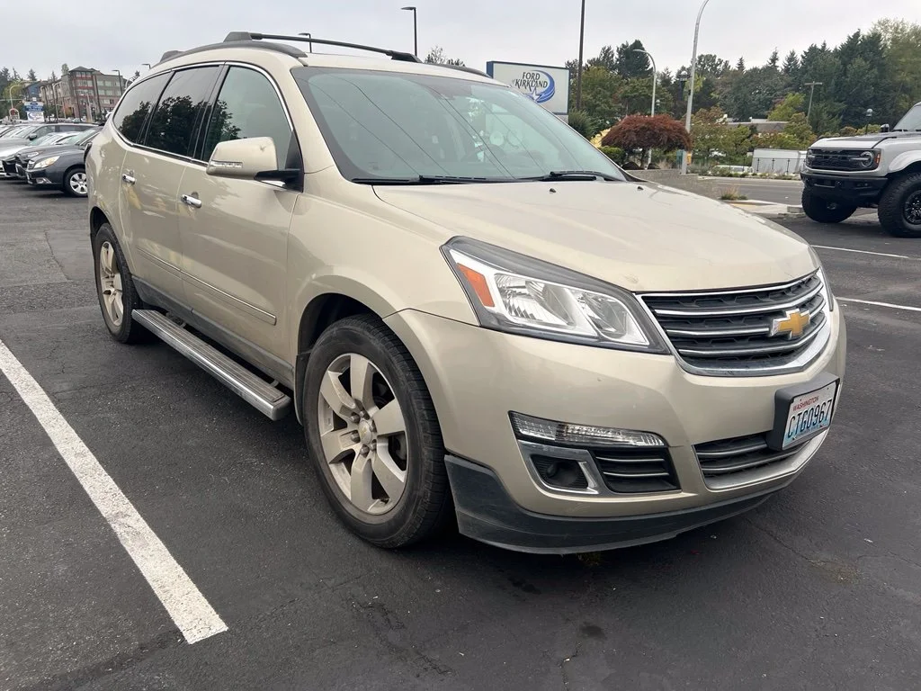 Used 2015 Champagne Silver Chevrolet LTZ image 1