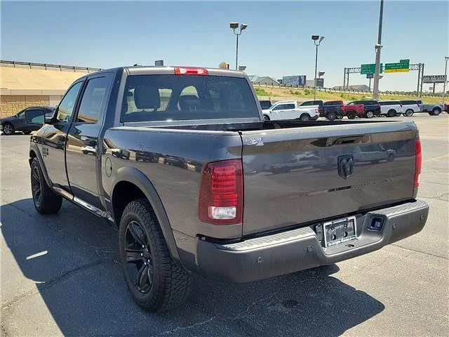 Used 2024 Granite Crystal Metallic Clearcoat RAM SLT 4x2 Crew Cab 5.6 ft. box 140 in. WB image 2