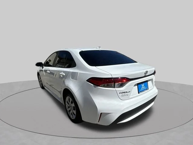 Used 2021 Super White Toyota LE image 3
