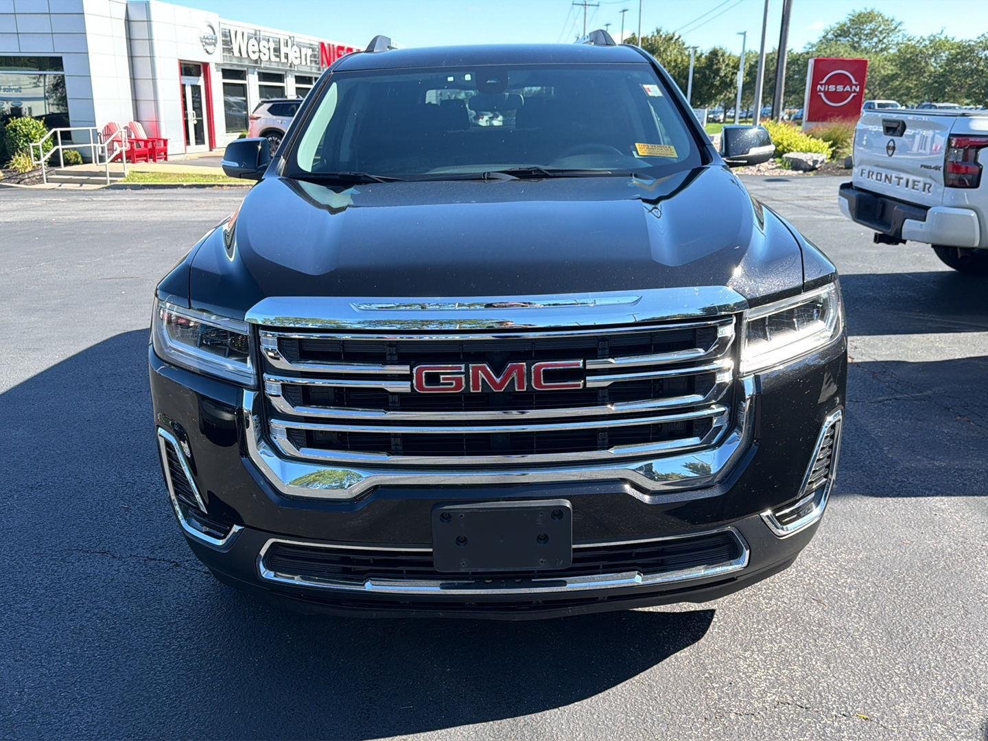 Used 2023 Ebony Twilight Metallic GMC SLE image 2