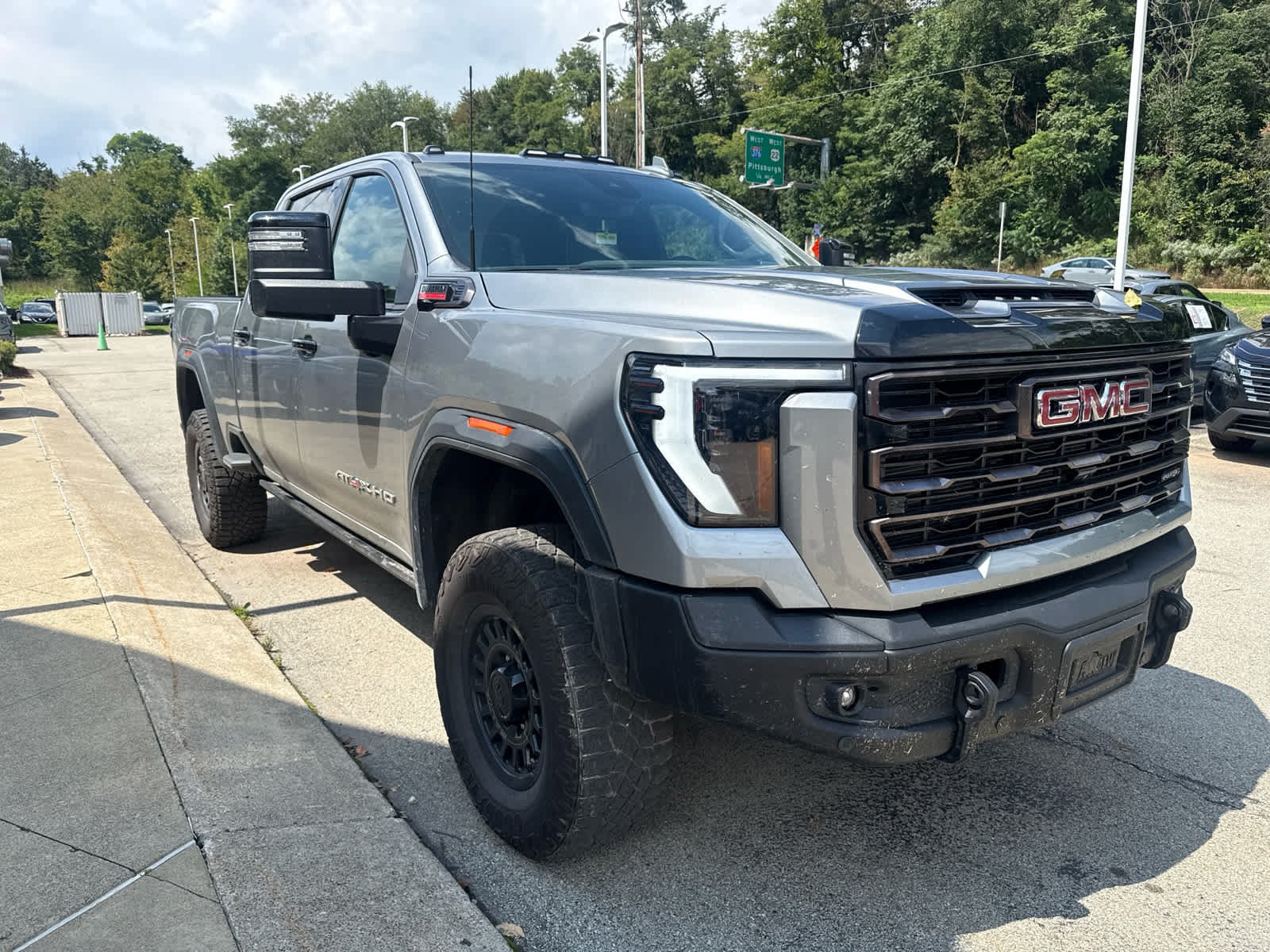 Used 2025 Sterling Metallic GMC AT4X image 1