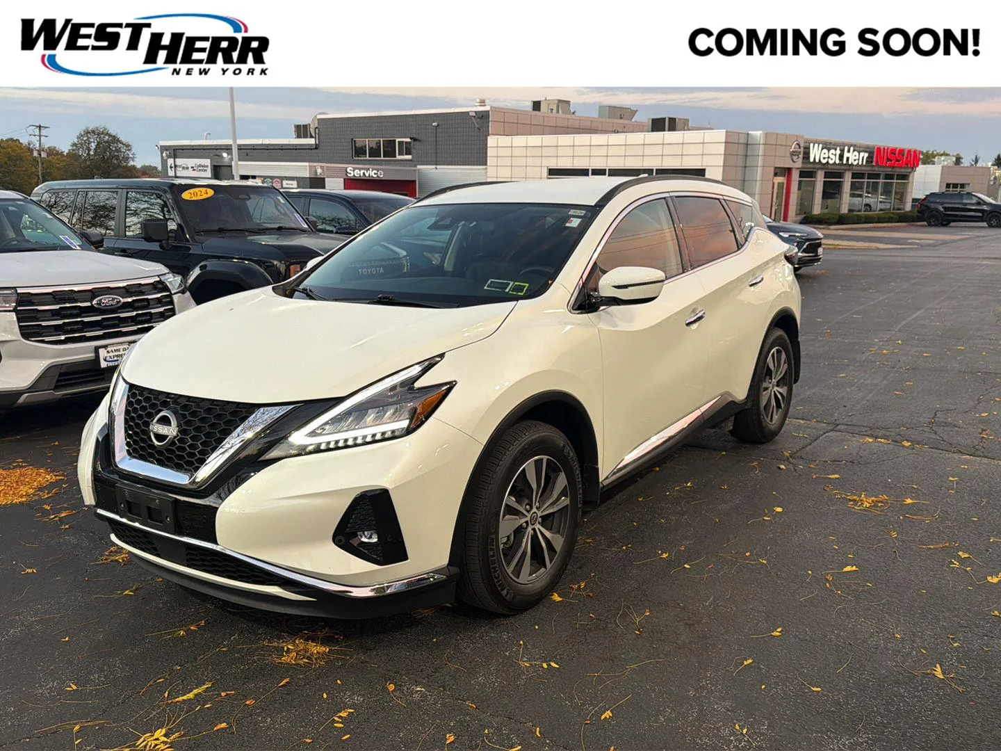 Used 2024 Pearl White Tricoat Nissan SV image 1