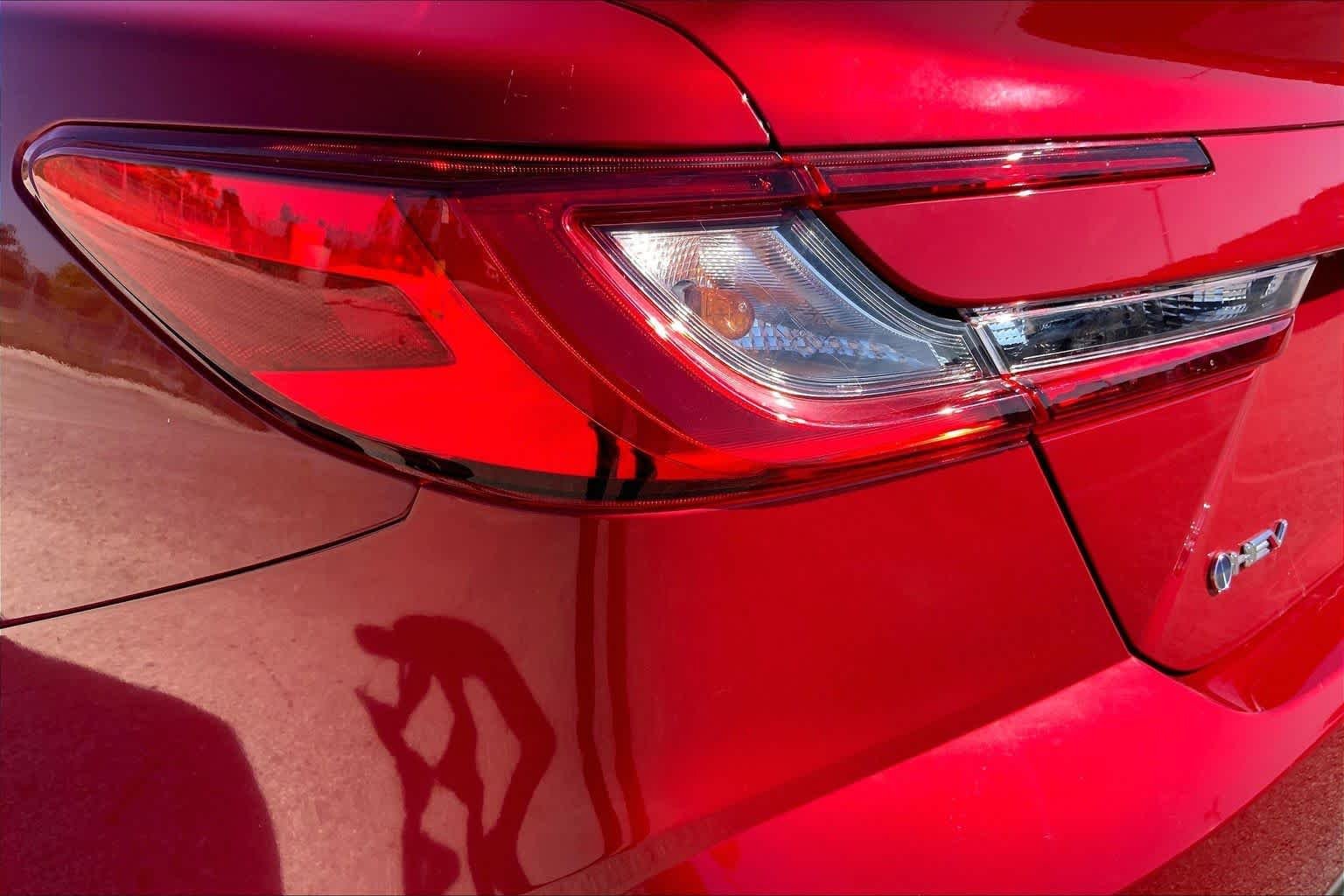 Used 2025 Supersonic Red Toyota LE image 28