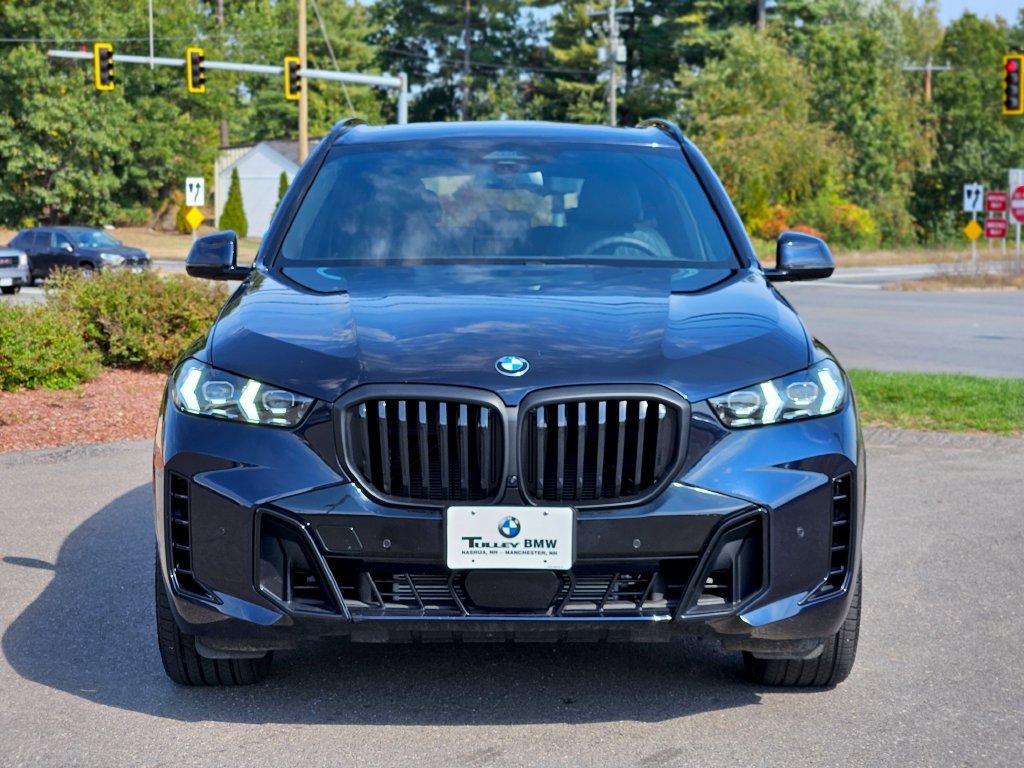 Certified Used 2025 Carbon Black Metallic BMW xDrive40i image 2