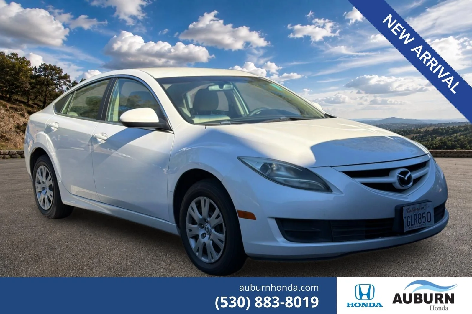 Used 2012 White Platinum Pearl Mazda i Sport image 1
