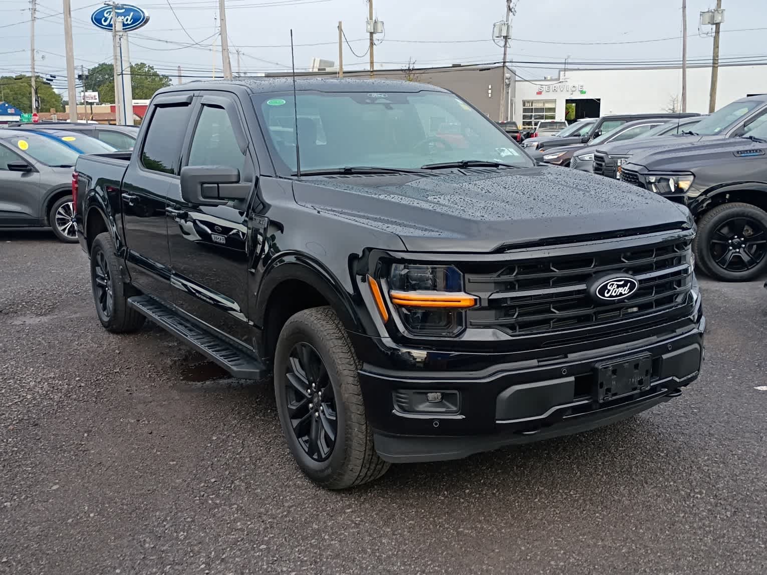 Used 2024 Agate Black Metallic Ford XLT image 2