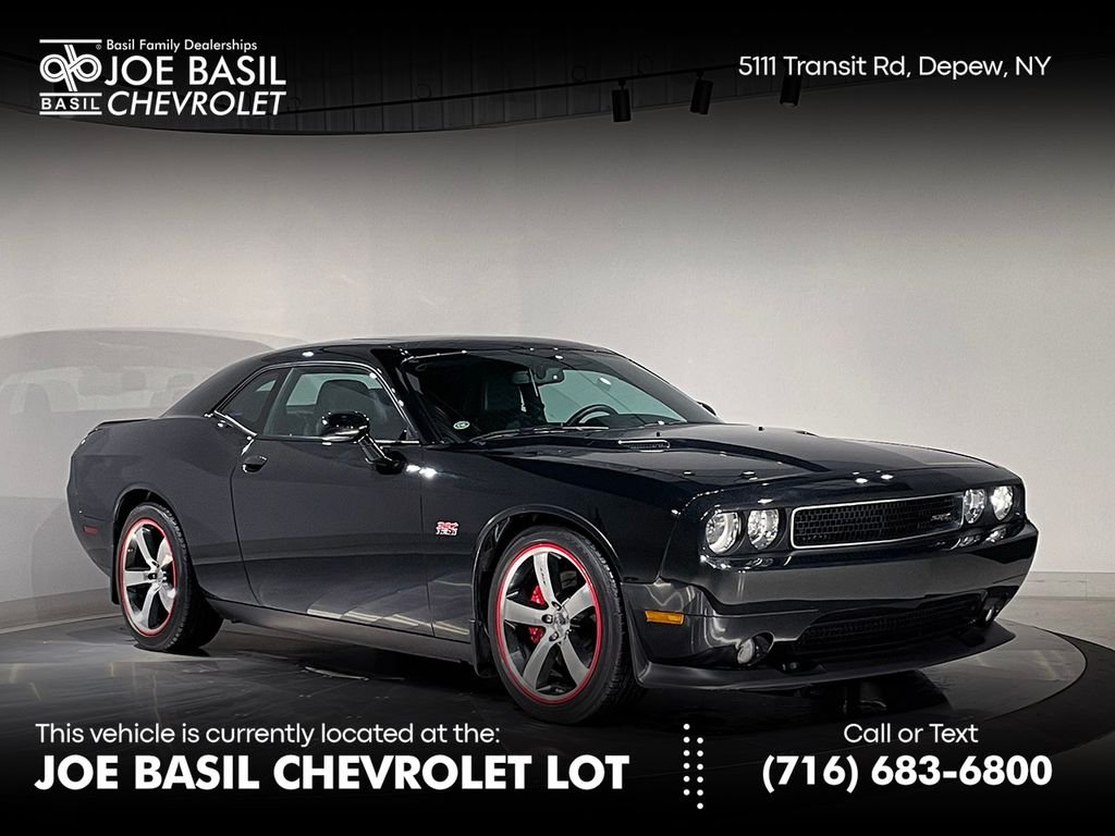 Used 2013 Black Dodge SRT8 image 1