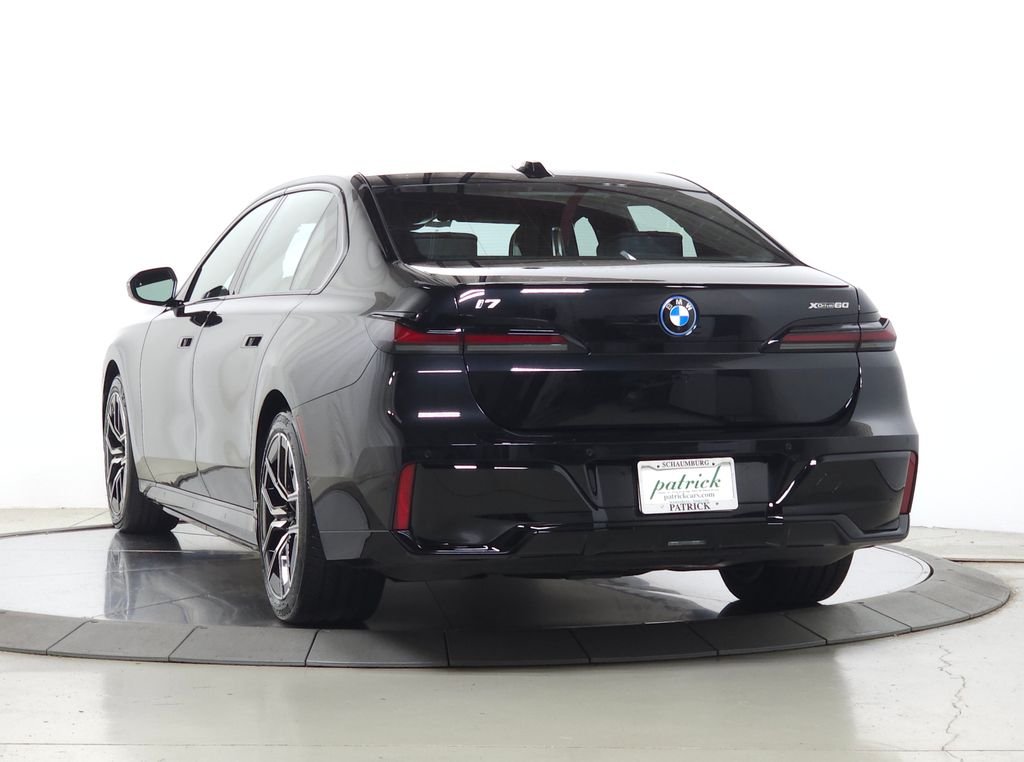 Used 2026 Black Sapphire Metallic BMW xDrive60 image 6