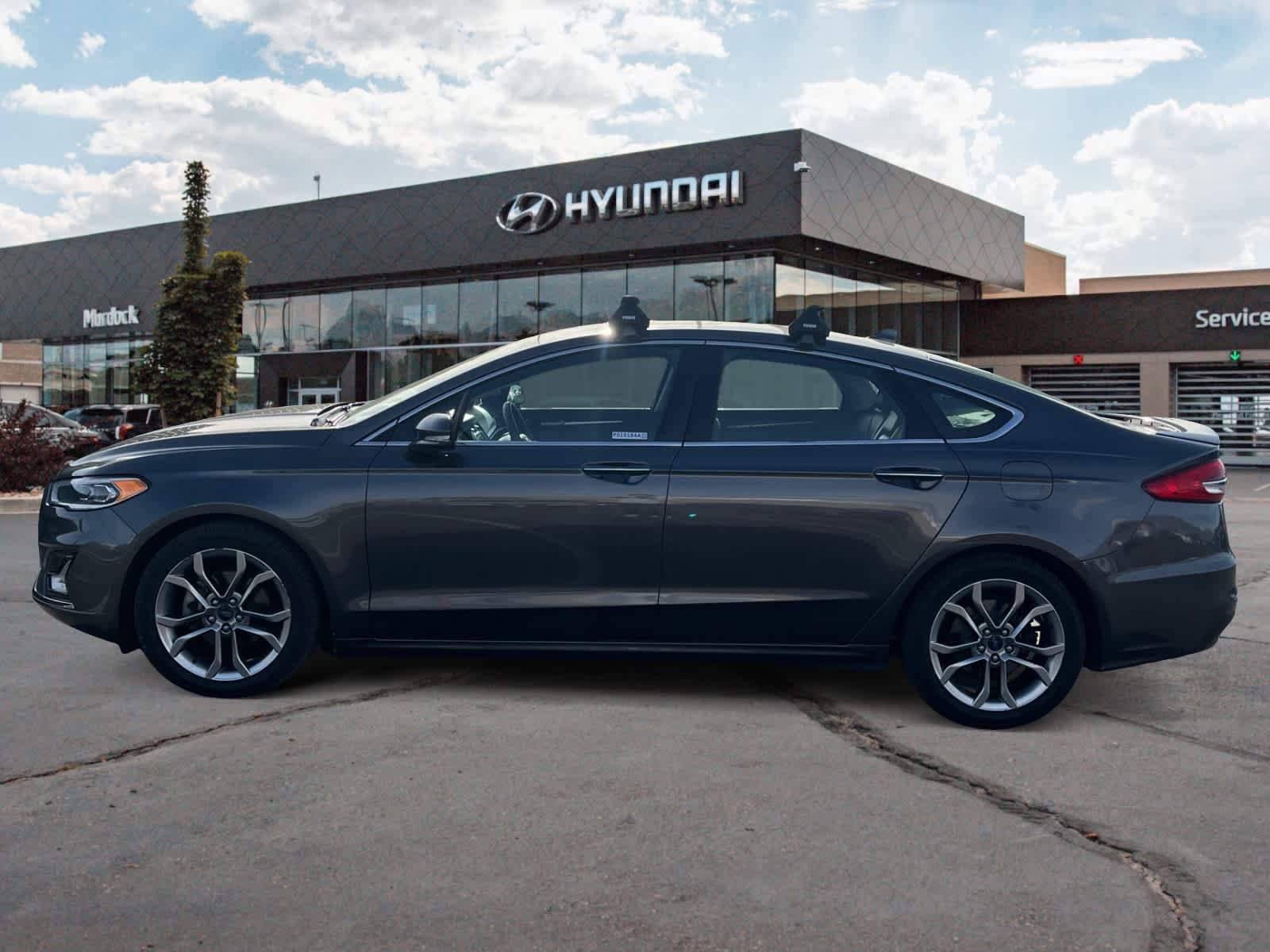 Used 2020 Ford Fusion Hybrid Titanium with VIN 3FA6P0RU3LR203857 for sale in Lindon, UT