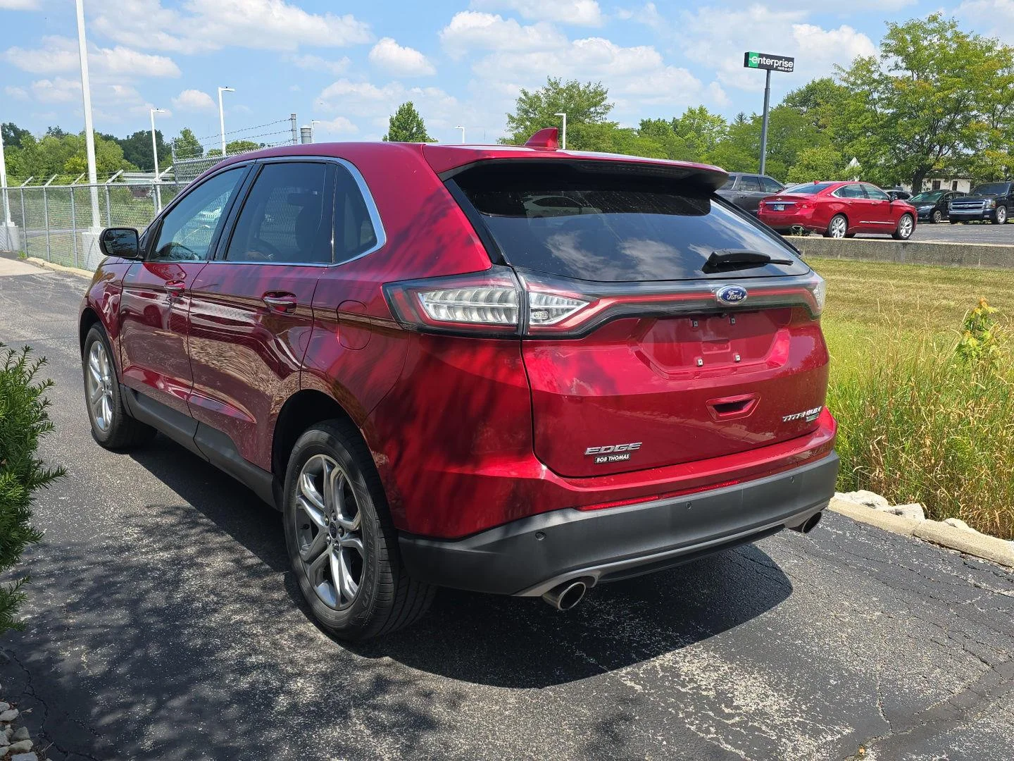 Used 2017 Ruby Red Metallic Tinted Clearcoat Ford Titanium image 5