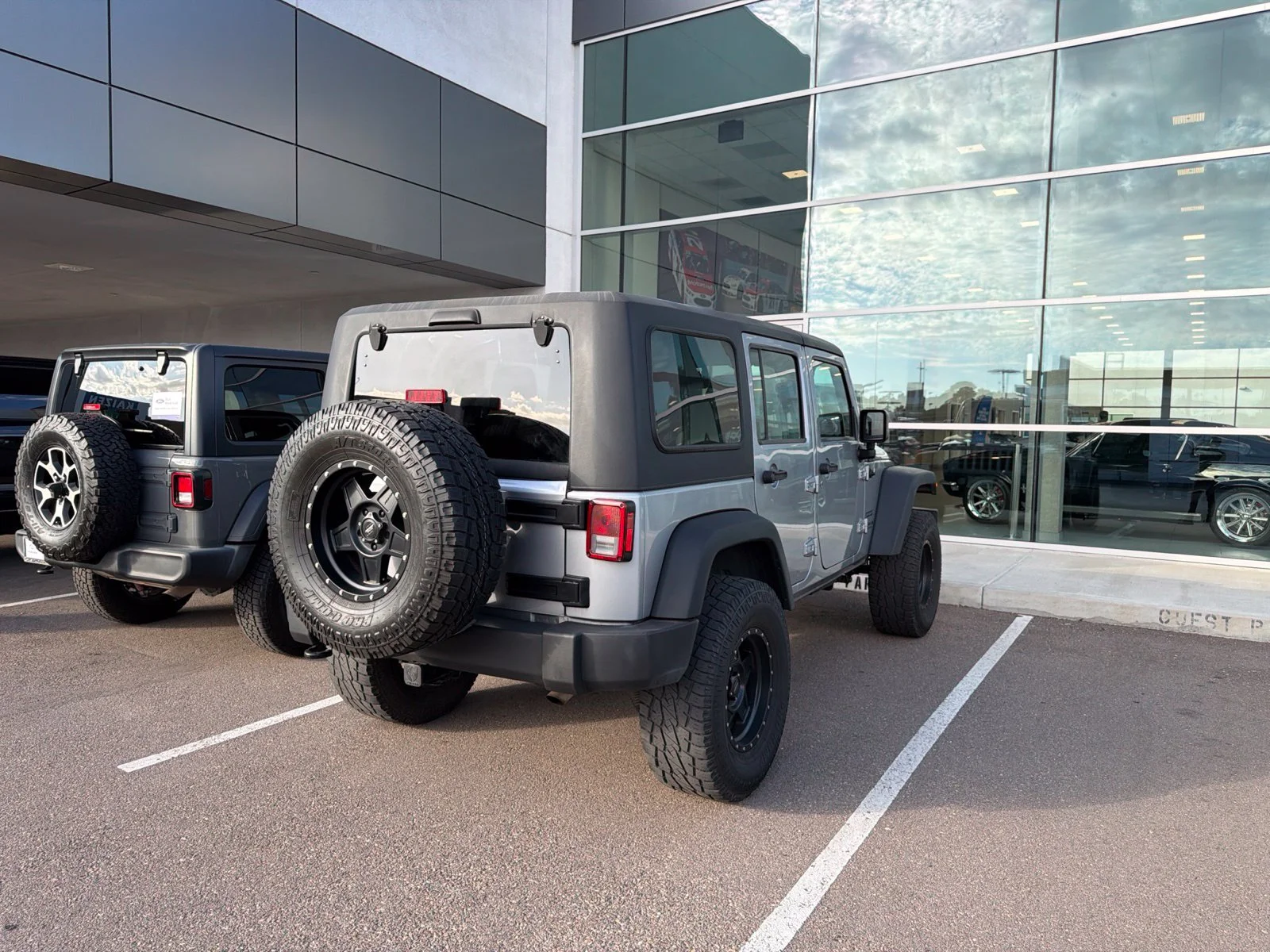 Used 2015 Silver Jeep Unlimited Sport image 3