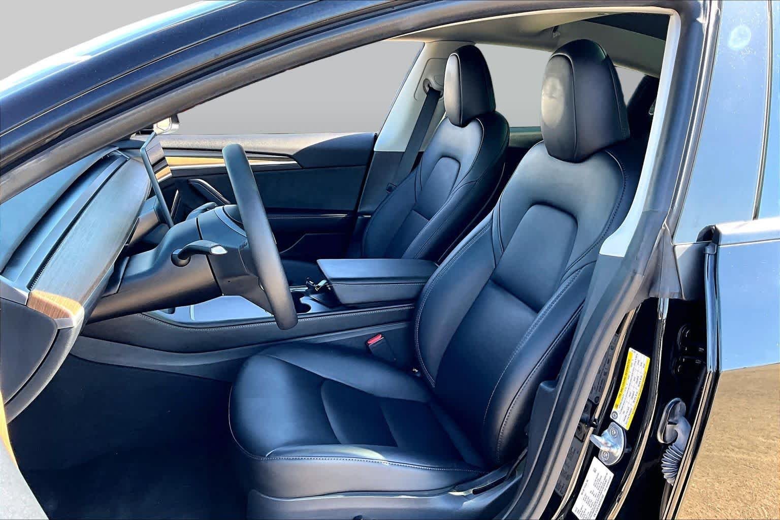 Used 2023 Solid Black Tesla  image 7