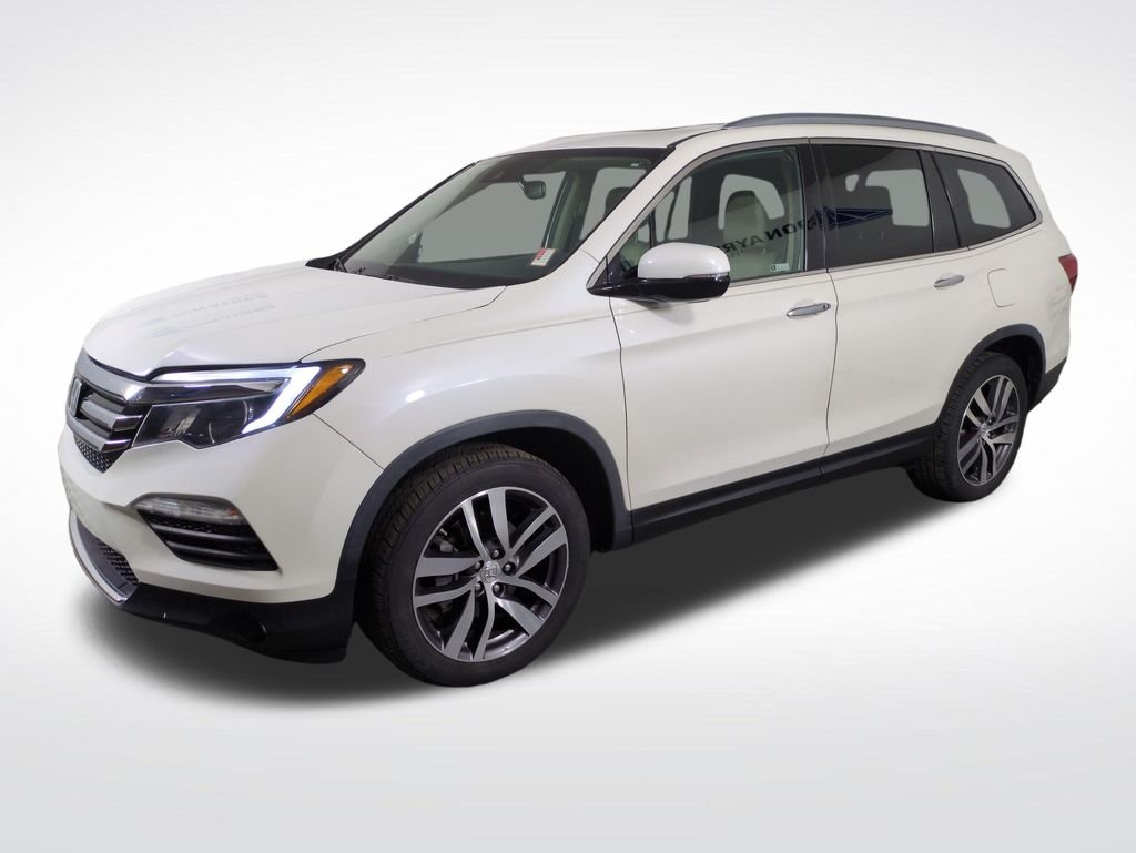 Used 2017 White Diamond Pearl Honda Touring image 1