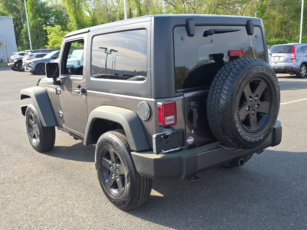 Used 2016 Granite Crystal Metallic Clear Coat Jeep Sport image 13