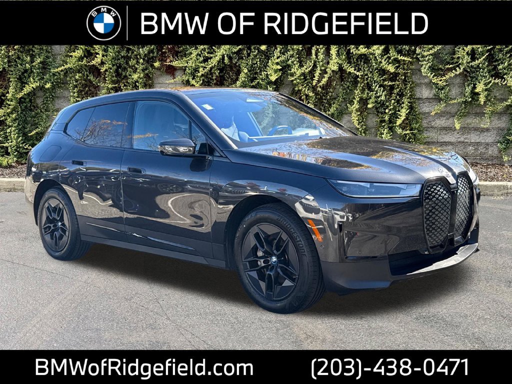 Used 2024 Dark Graphite Metallic BMW xDrive50 image 1