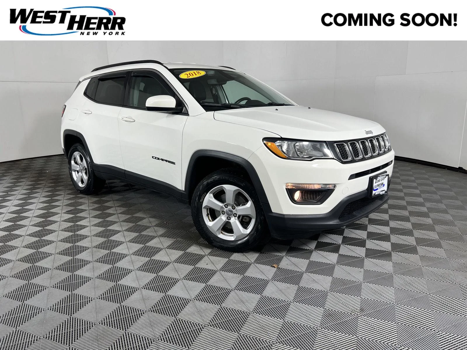 Used 2018 White Clearcoat Jeep Latitude image 1