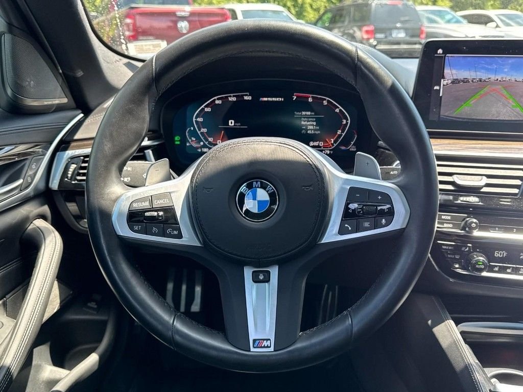 Used 2023 Black Sapphire Metallic BMW M550i xDrive image 13