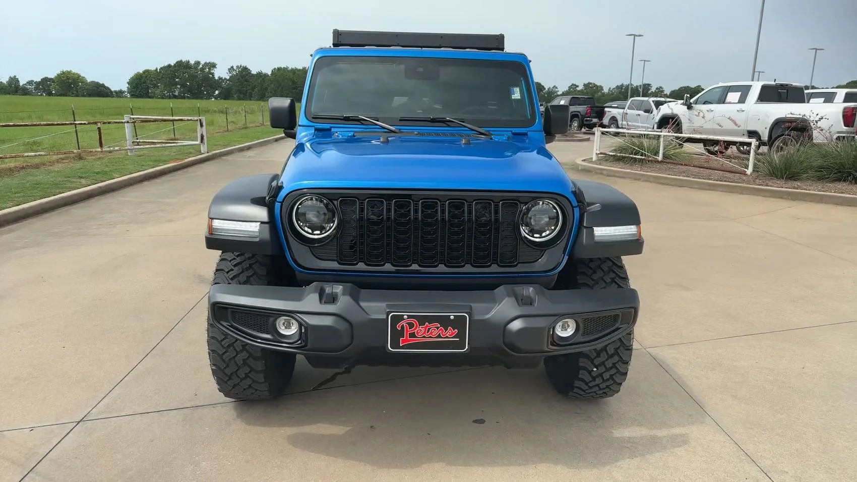 Used 2024 Hydro Blue Pearl Coat Jeep Sport image 4