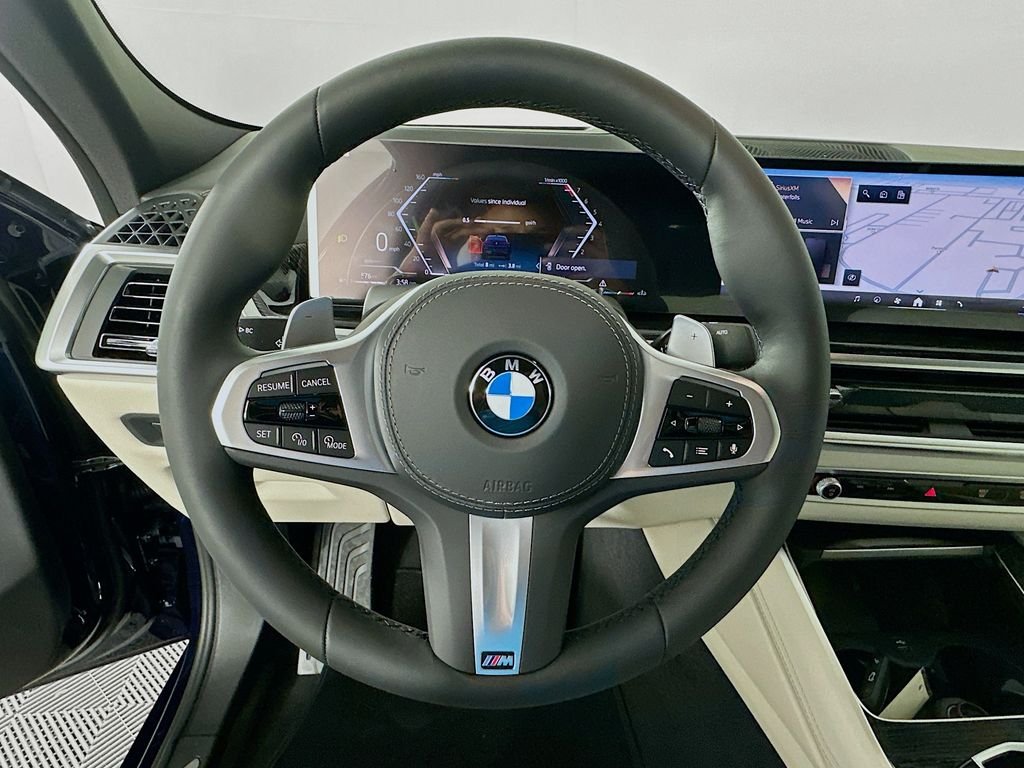 Used 2026 Tanzanite Blue II Metallic BMW xDrive40i image 10