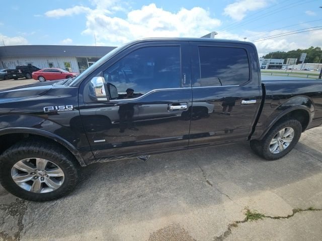 Used 2015 Black Ford Platinum image 1