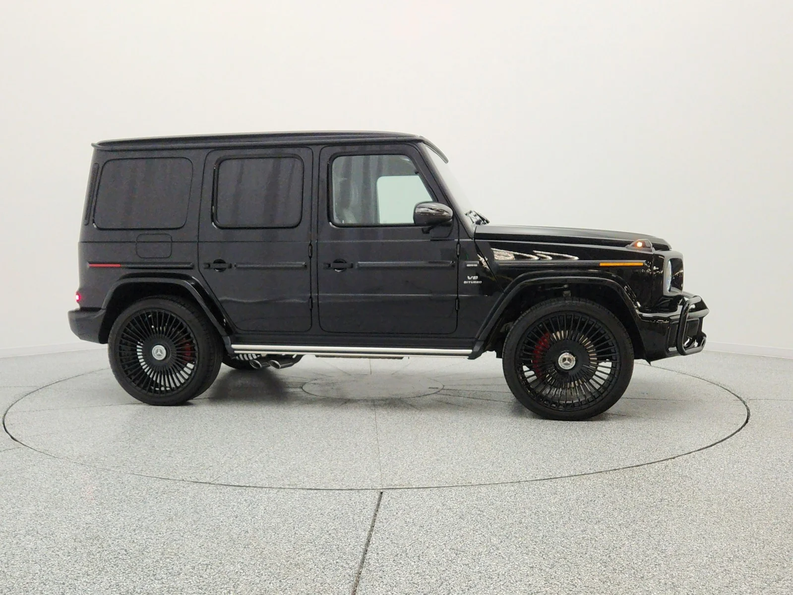Used 2025 Obsidian Black Metallic Mercedes-Benz AMG® G 63 SUV image 4