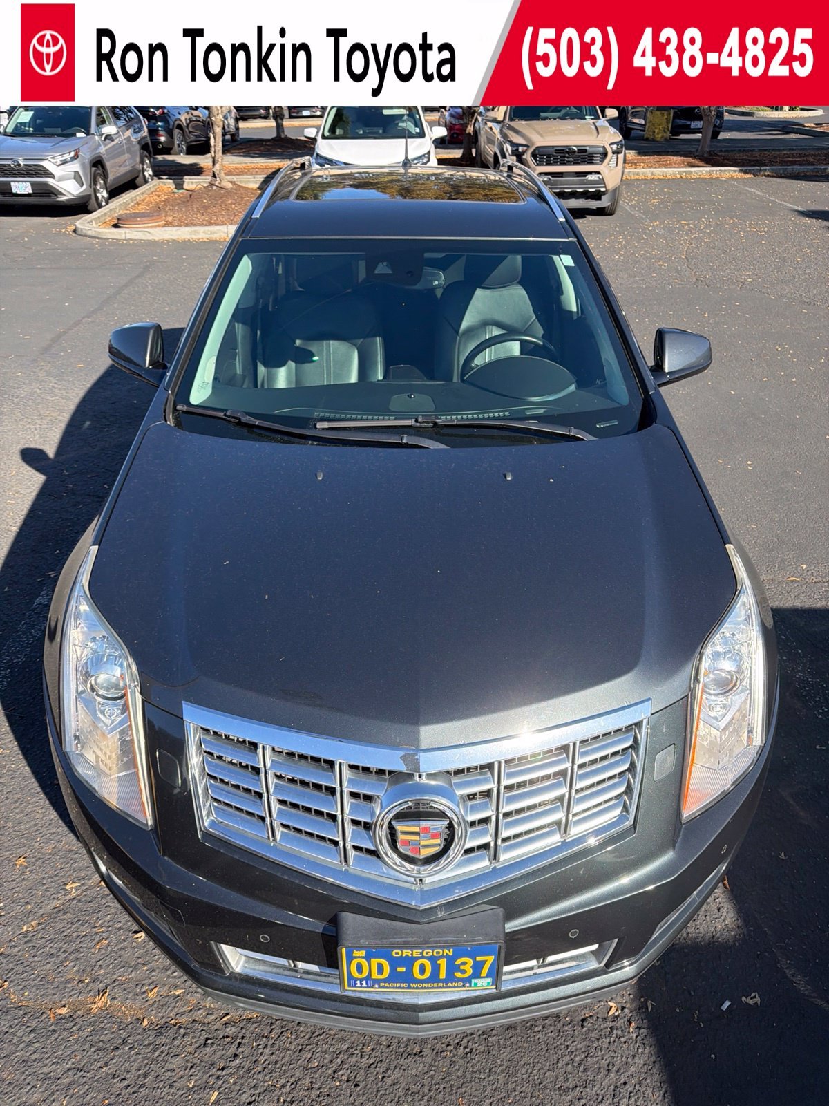 Used 2014 Graphite Metallic Cadillac Premium image 1