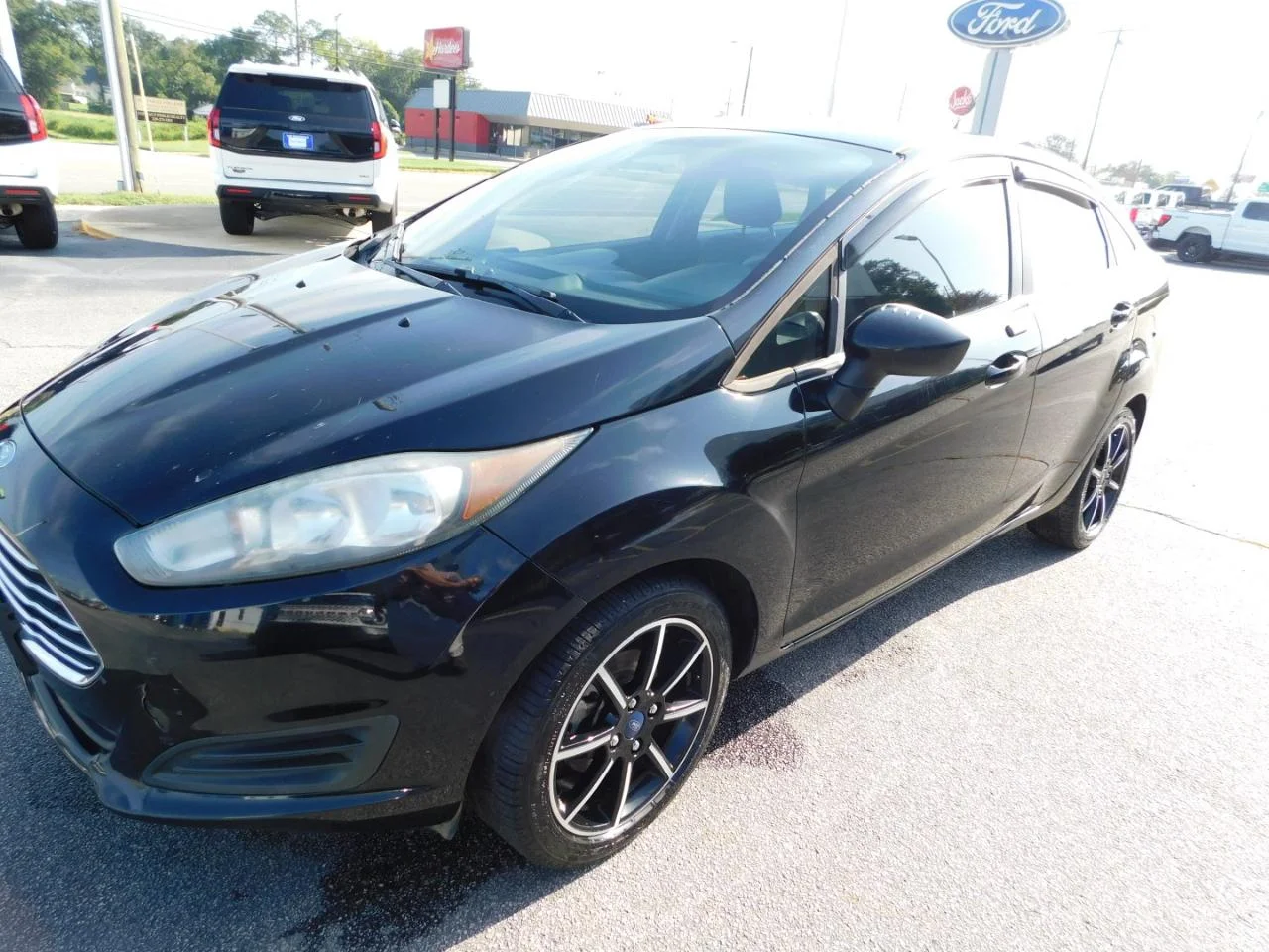 Used 2018 Black Ford SE SEDAN image 4