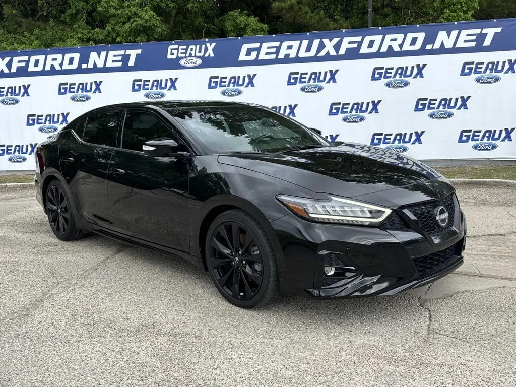 Used 2023 Black Nissan SR image 1