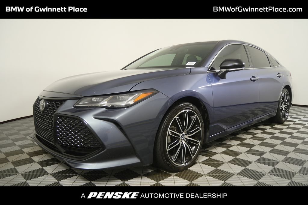 Used 2019 Harbor Gray Metallic Toyota XLE image 1
