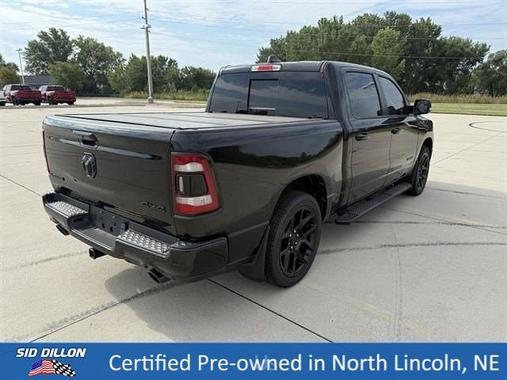Used 2023 Diamond Black Crystal Pearl Coat Ram Laramie image 8