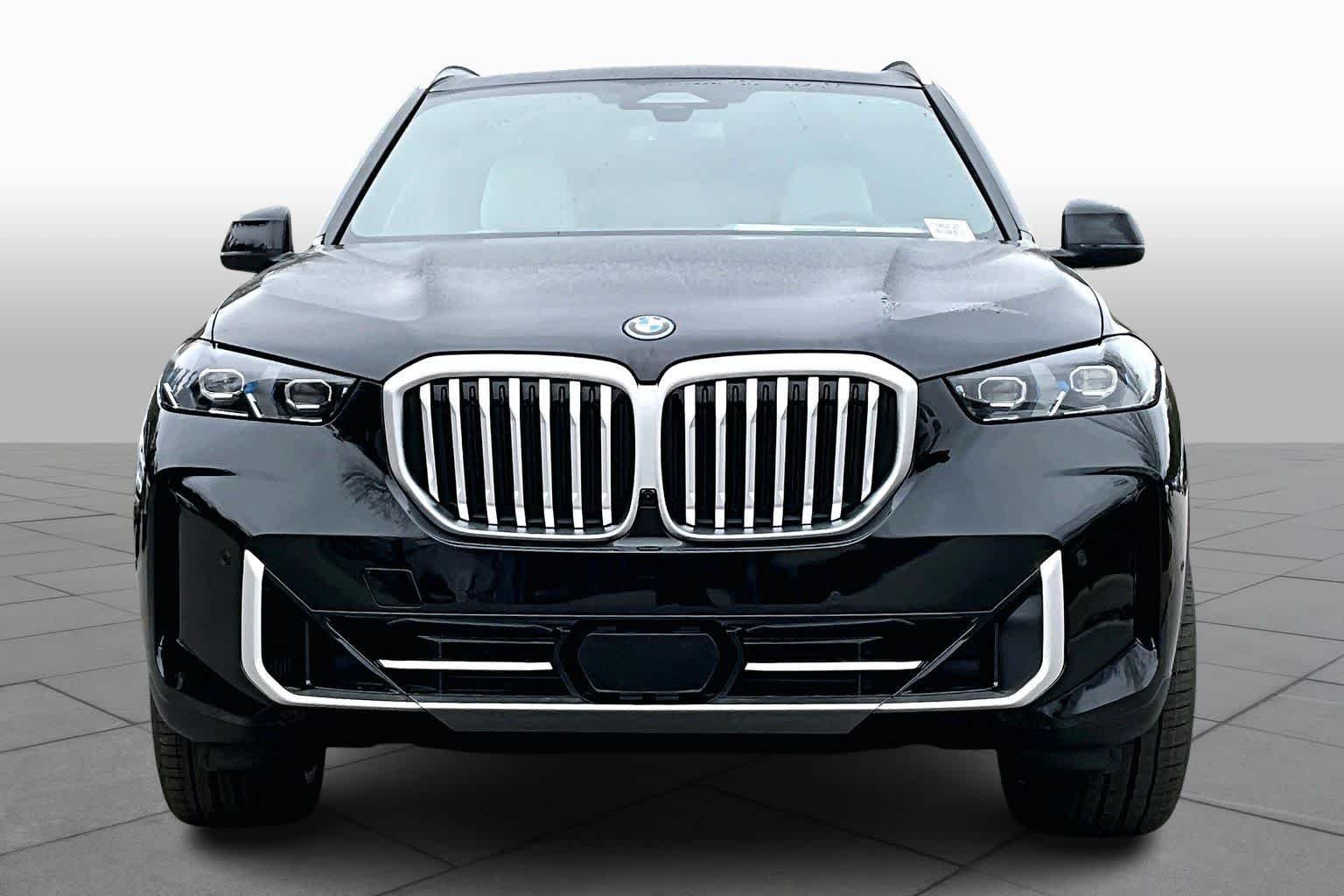 New 2026 Black Sapphire Metallic BMW xDrive50e image 3