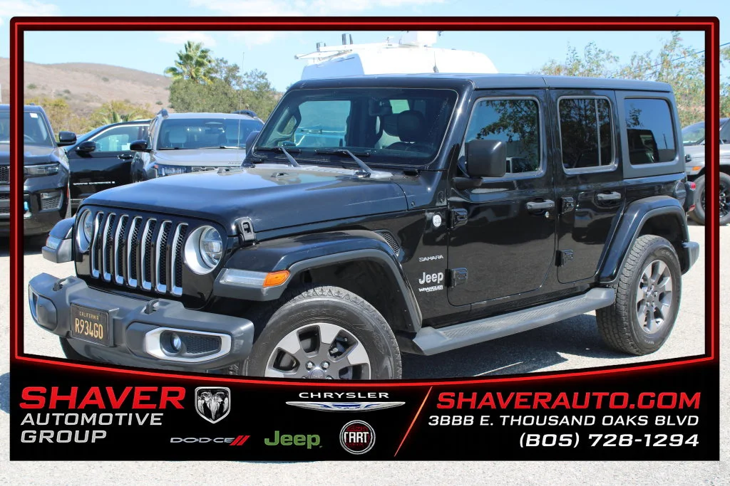 Used 2018 Black Jeep Unlimited Sahara image 1