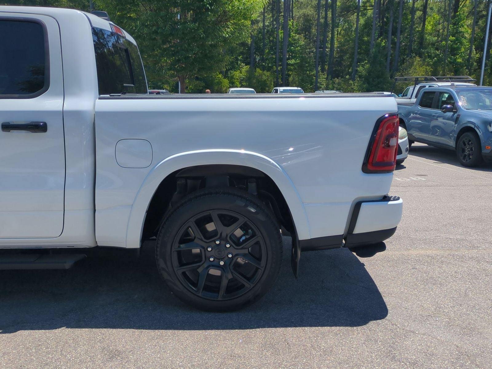 Used 2025 BRIGHT WHITE CLEARCOAT DODGE LARAM image 11