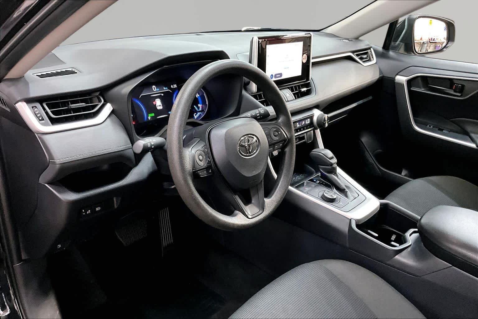 Used 2025 Midnight Black Metallic Toyota Hybrid LE image 18