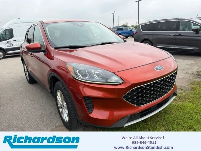 Used 2020 Orange Metallic Ford SE image 1