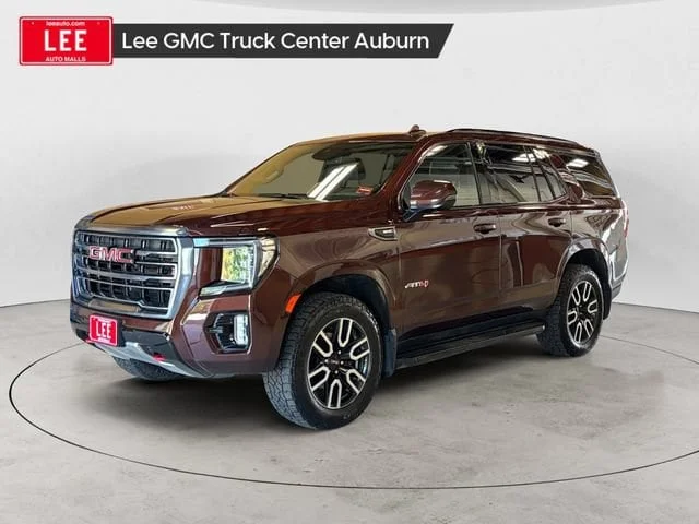 Used 2023 Redwood Metallic GMC AT4 image 1